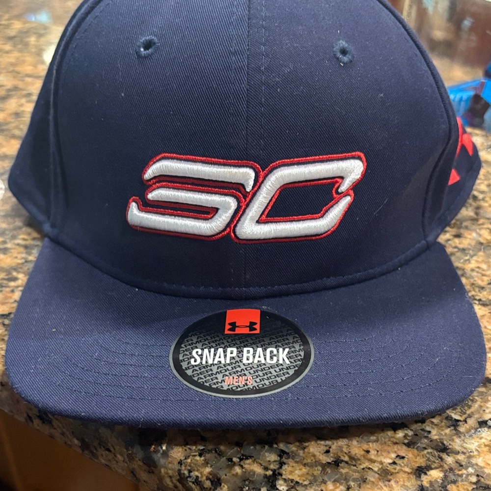 Under Armour Seth Curry Snap Back Dark Blue Cap with Red and White Logo NWT